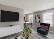 Thumbnail 1 of 30 - a living room with a tv on the wall and a table and chairs in the background