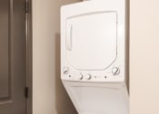 Thumbnail 8 of 24 - a washer and dryer in a room
