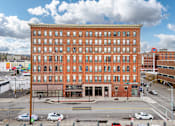 Thumbnail 41 of 68 - A large red brick building with many windows is in the city street. at 206 Flats Apartments, Washington, 99201