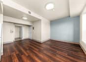 Thumbnail 47 of 68 - A room with wooden floors and a white ceiling. at 206 Flats Apartments, Washington