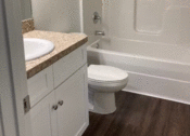 Thumbnail 4 of 9 - a bathroom with a toilet sink and bathtub