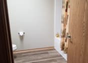 Thumbnail 14 of 14 - a bathroom with a toilet and a shower curtain