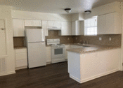 Thumbnail 9 of 9 - a kitchen with white appliances and white cabinets