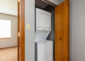 Thumbnail 23 of 23 - an empty laundry room with a washer and dryer in it