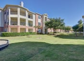Thumbnail 25 of 25 - Exterior of buildings with lots of green space  at Clearwater Creek, Richardson