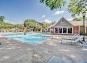 Thumbnail 30 of 32 - our apartments have a resort style pool with lounge chairs