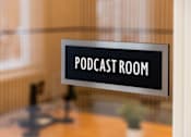 Thumbnail 50 of 57 - A sign that says Podcast Room is hanging on a wall.