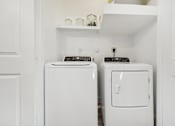 Thumbnail 13 of 24 - In-unit laundry room at parcHAUS at Celina Parkway, 75009, the perfect apartment alternative for convenience.
