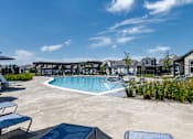 Thumbnail 21 of 24 - Swimming Pool at parcHAUS at Celina Parkway, Texas, 75009.  redefining apartment-style living in Celina.