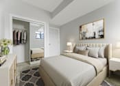 Thumbnail 8 of 30 - A bedroom with a large bed and a painting on the wall.