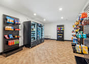 Thumbnail 53 of 99 - A row of black vending machines are lined up against a wall.