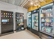 Thumbnail 72 of 103 - A Pepsi vending machine is next to a soda machine.
