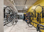 Thumbnail 74 of 103 - A bike rack with many bicycles parked in it.