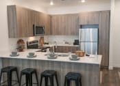 Thumbnail 3 of 33 - Eat-In Kitchen at Foothill Lofts Apartments & Townhomes, Utah, 84341