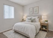 Thumbnail 5 of 18 - Primary Bedroom with Bed at Peppertree