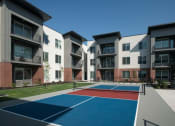 Thumbnail 28 of 33 - Pickleball court at Foothill Lofts Apartments & Townhomes, Logan, 84341