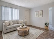 Thumbnail 1 of 18 - Living Room with Couch at Peppertree
