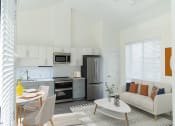Thumbnail 17 of 29 - Living Room in a Carriage Unit The Arza Apartments