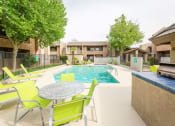 Thumbnail 20 of 24 - Poolside Dining Tables at Cimarron Place Apartments, Tucson