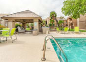 Thumbnail 22 of 24 - Lounging By The Pool at Cimarron Place Apartments, Arizona, 85712