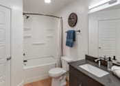 Thumbnail 18 of 34 - Bright Bathroom at Maye House Apartments