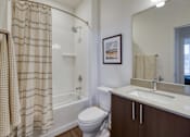 Thumbnail 6 of 20 - Bright Bathroom at Orchard Park Apartments