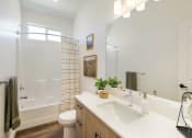 Thumbnail 6 of 23 - Bright Bathroom at Orchard Park Townhomes