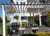 Thumbnail 34 of 40 - Resident Courtyard & BBQ at Metropolitan Collection Apartments, Renton, WA