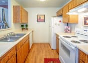 Thumbnail 4 of 26 - Modern Kitchen With Custom Cabinet at Aspen Park Apartments, California, 95823