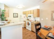 Thumbnail 4 of 15 - Dining Room and Kitchen View at Bent Tree Apartments, Sacramento, California
