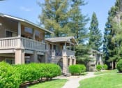 Thumbnail 2 of 15 - Courtyard With Mature Trees at Bent Tree Apartments, California, 95842