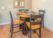 Thumbnail 7 of 15 - Dining Room with Hardwood Style Flooring at Bent Tree Apartments, Sacramento, 95842