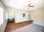 Thumbnail 12 of 24 - Living Room With Dining Area at Creekside Villas Apartments, San Diego, California