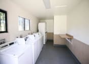Thumbnail 15 of 24 - Community Laundry Facility at Creekside Villas Apartments, San Diego, CA, 92102