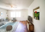 Thumbnail 3 of 24 - Classic Living Room Design With Television at Creekside Villas Apartments, California