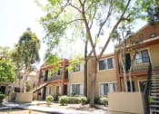 Thumbnail 2 of 24 - Elegant Exterior View at Creekside Villas Apartments, San Diego, CA, 92102