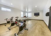 Thumbnail 16 of 23 - Cardio Area at Falls at Riverwoods