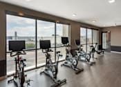 Thumbnail 22 of 42 - Cardio Equipment at City Lofts Apartments