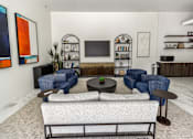 Thumbnail 32 of 48 - Chairs in Front of the TV at The Arza Apartments