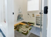 Thumbnail 47 of 61 - Playroom in Clubhouse at Parc at Day Dairy Apartments and Townhomes, Draper, UT, 84020