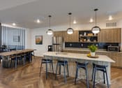 Thumbnail 9 of 11 - Decorative Clubhouse Kitchen at Matheson Apartments in Tremonton UT
