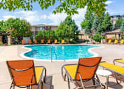 Thumbnail 27 of 44 - Relaxing Pool Area With Sundeck at Echo Ridge Apartments, Castle Rock, CO