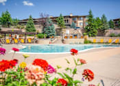 Thumbnail 1 of 44 - Swimming Pool With Relaxing Sundecks at Echo Ridge Apartments, Castle Rock, CO