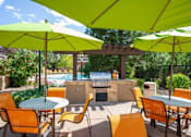 Thumbnail 38 of 44 - Outdoor Grill With Intimate Seating Area at Echo Ridge Apartments, Colorado