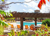 Thumbnail 30 of 44 - Pool Side Relaxing Area at Echo Ridge Apartments, Castle Rock, CO, 80108