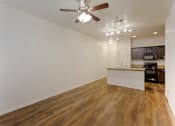 Thumbnail 18 of 25 - Kitchen and Living Room at Talavera at the Junction
