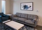 Thumbnail 17 of 27 - Desert Sage Furnished Suite Living Room SOL