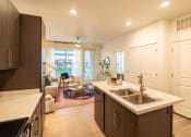 Thumbnail 12 of 38 - Kitchen Island at Garden Lofts Apartments, Salt Lake City, Utah