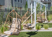 Thumbnail 22 of 39 - Egg Chairs in Courtyard at The Austin Townhomes