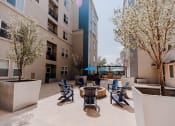 Thumbnail 23 of 27 - Outdoor Firepit with Lounge Chairs at Providence Place Apartments, Salt Lake City, UT